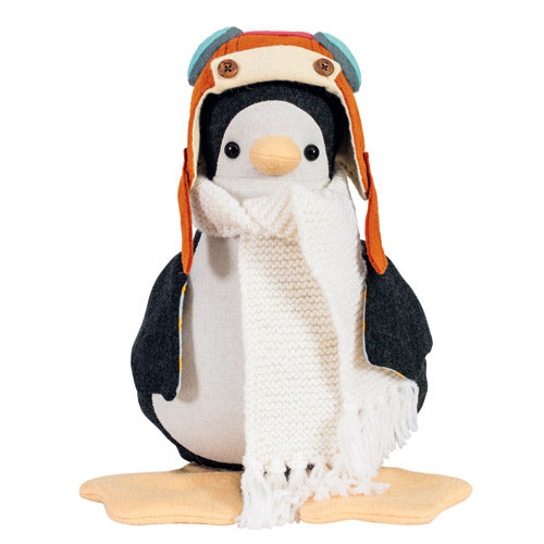 Flat shot of aviator penguin softie wearing knitted scarf and aviator helmet