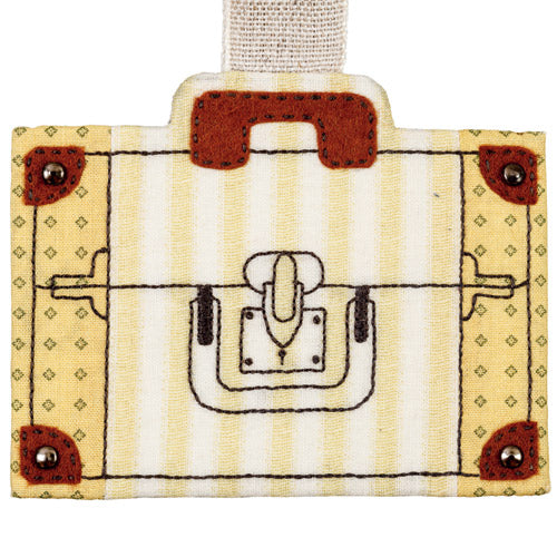Flat shot of traditional-style suitcase with embroidered detail