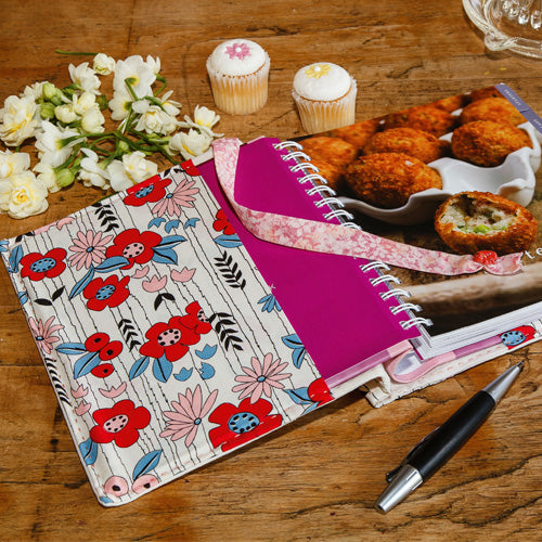 Closeup styled shot of inside of embroidered recipe journal cover