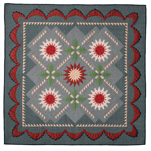 Flat shot of appliqué starburst quilt pattern