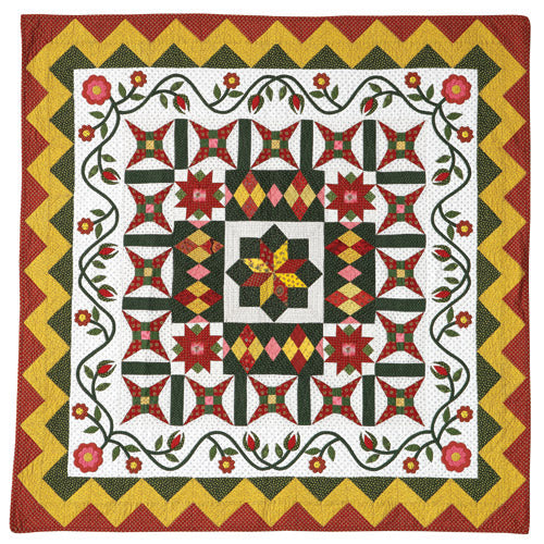 Flat shot of patchwork and appliqué quilt