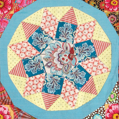 Closeup of block from english paper pieced star coverlet quilt