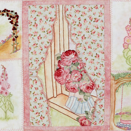 Closeup of appliqué and embroidered window centre motif