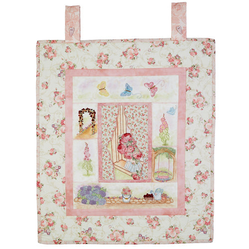 Flat shot of embroidered flower garden wallhanging