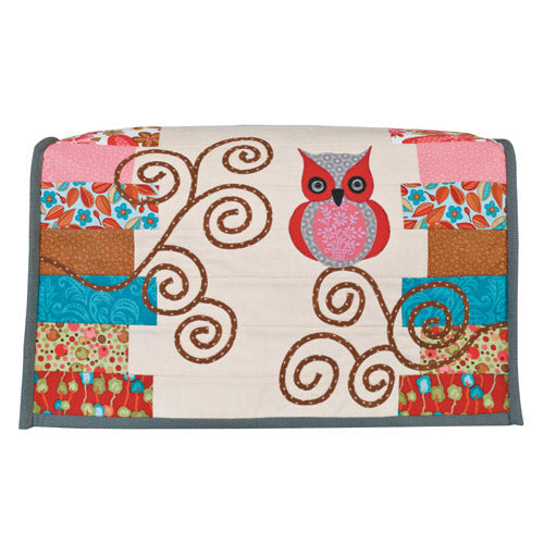 Flat shot of appliqué owl sewing machine cover