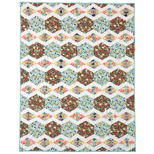 Flat shot of diamond and hexagon patchwork quilt