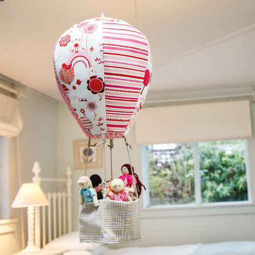 Styled shot of children's hot air balloon toy mobile
