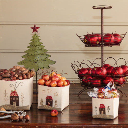 Styled shot of appliqué and embroidered snack boxes with treats