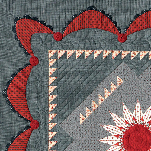 Closeup of swag and patchwork border from starburst quilt